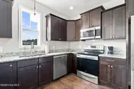 261 Bronze Drive, Rocky Point, NC 28457 — 3-bedroom waterfront home in The Knolls at Turkey Creek, Rocky Point, NC, photo 12 of 58