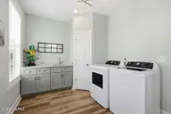 111 Jade Street, Beaufort, NC 28516 — 3-bedroom home in Jade Point, Beaufort, NC, photo 6 of 49: Laundry Room with storage closet