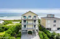 100 Oleander Court, Surf City, NC 28445 — 8-bedroom waterfront home in Bland Shores, Surf City, NC, photo 2 of 72: DJI_0577