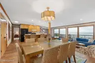 111 Dogwood Circle, Pine Knoll Shores, NC 28512 — 4-bedroom waterfront home in Pine Knoll Association, Pine Knoll Shores, NC, photo 4 of 52: Open concept kitchen and dining