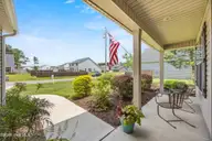 203 Stackleather Place, Sneads Ferry, NC 28460 — 4-bedroom home in Permeta Branch, Sneads Ferry, NC, photo 3 of 68: 8_front porch