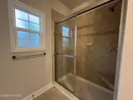 1167 Natal Drive SE, Bolivia, NC 28422 — 4-bedroom home in Palmetto Creek, Bolivia, NC, photo 16 of 40: Primary Shower