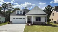 2013 Brisco Way 4, Leland, NC 28451 — 3-bedroom home in Brunswick Forest, Leland, NC, photo 1 of 36: Exterior