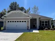 182 Cherry Laurel Drive, Wallace, NC 28466 — 4-bedroom home in River Landing, Wallace, NC, photo 1 of 28: Exterior