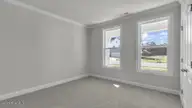 1020 Martin Farms Boulevard, Aberdeen, NC 28315 — 4-bedroom home in Martin Farms, Aberdeen, NC, photo 22 of 35: Bedroom
