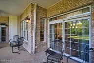 240 Cochrane Castle Circle Apt E, Pinehurst, NC 28374 — 1-bedroom condo in National, Pinehurst, NC, photo 18 of 46: Walk-out from Great Room & Bedroom