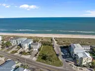 402 1 Fort Fisher Boulevard N, Kure Beach, NC 28449 — waterfront lot in Kure Dunes, Kure Beach, NC, photo 2 of 55: 6-web-or-mls-DJI_20251022155348_0919_D