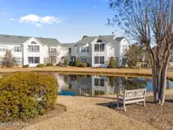 3810 River Front Place Unit 102, Wilmington, NC 28412 — 2-bedroom condo in Rivers Edge, Wilmington, NC, photo 2 of 22: 2-web-or-mls-DJI_20260213100400_0356_D