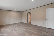 3080 Cross Street SW, Shallotte, NC 28470 — 3-bedroom manufactured home in Shell Point, Shallotte, NC, photo 16 of 35: Primary Suite