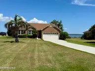 615 Willbrook Circle, Sneads Ferry, NC 28460 — 3-bedroom waterfront home in New River Plantation, Sneads Ferry, NC, photo 1 of 48