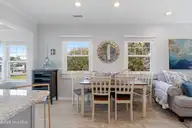 213 W Bogue Sound Drive, Atlantic Beach, NC 28512 — 3-bedroom waterfront home in Sound View Isles, Atlantic Beach, NC, photo 11 of 50: Dining area