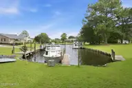 1210 Pelican Drive, New Bern, NC 28560 — 3-bedroom waterfront home in Fairfield Harbour, New Bern, NC, photo 2 of 48: Your own Boat Dock