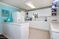 1025 W Beach Drive, Oak Island, NC 28465 — 3-bedroom waterfront home, Oak Island, NC, photo 15 of 45: 1025 W Beach 13