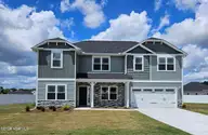 5703 Sloop Court, New Bern, NC 28560 — 4-bedroom home in Fairfield Harbour, New Bern, NC, photo 2 of 49: 2721 front