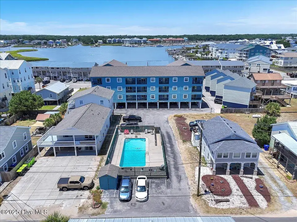 1404 Canal Drive 15, Carolina Beach, NC 28428 — 2-bedroom condo in Ocean Harbor, Carolina Beach, NC, photo 1 of 32: 41-Final 1404 Canal Dr Unit 15-RJREM--7