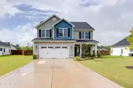 148 W Broughton Lane, Rocky Point, NC 28457 — 4-bedroom home in Wylie Branch, Rocky Point, NC, photo 3 of 53: Front