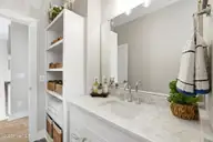 135 NE 75th Street, Oak Island, NC 28465 — 4-bedroom home in Tranquil Harbor, Oak Island, NC, photo 18 of 37: 2nd Bathroom