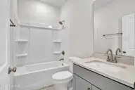 3048 Coastal Dream Way, Leland, NC 28451 — 4-bedroom townhome in Grand Park, Leland, NC, photo 18 of 39: Bath 3