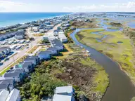 825a N New River Drive, Surf City, NC 28445 — 4-bedroom waterfront townhome, Surf City, NC, photo 13 of 49: 040_dji_20261001120251_0103_dp_417