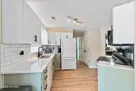 157 NE 3rd Street, Oak Island, NC 28465 — 2-bedroom home in Tranquil Harbor, Oak Island, NC, photo 23 of 74