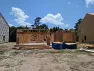210 S Umbrella Palm Drive, Hampstead, NC 28443 — 3-bedroom home in Southwater Village, Hampstead, NC, photo 2 of 17