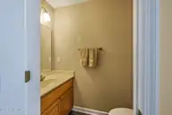 514 Woods Court SW, Sunset Beach, NC 28468 — 3-bedroom home in Sea Trail Plantation, Sunset Beach, NC, photo 24 of 50: 52-web-or-mls-43 half bathroom