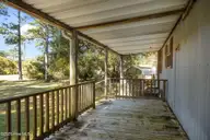 1527 Hibbs Road, Newport, NC 28570 — 2-bedroom manufactured home, Newport, NC, photo 21 of 32: Covered Front Deck