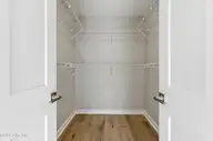 114 Jordan Drive, New Bern, NC 28562 — 4-bedroom waterfront townhome in Wesmill Pond Estates, New Bern, NC, photo 19 of 37: Primary Bedroom Walk In Closet
