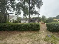 214 Trails End Road, Wilmington, NC 28409 — 3-bedroom waterfront manufactured home in Trails End, Wilmington, NC, photo 3 of 32: A38D5ACC-A6EE-4E85-814A-EDE396132EDD