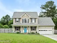 153 Lawndale Lane, Sneads Ferry, NC 28460 — 3-bedroom home in Justice Farm, Sneads Ferry, NC, photo 1 of 23: Front