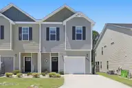 403 Frisco Way, Holly Ridge, NC 28445 — 3-bedroom townhome in The Landing At Folkstone, Holly Ridge, NC, photo 1 of 55