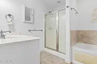 76 Calabash Drive, Calabash, NC 28467 — 3-bedroom home in Carolina Shores, Calabash, NC, photo 19 of 32: Owners bathroom with walkin shower