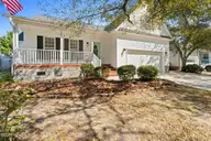 6 White Lane, Oak Island, NC 28465 — 3-bedroom home, Oak Island, NC, photo 1 of 32: shniderproductions.com-7