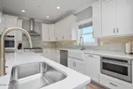 2918 E Beach Drive, Oak Island, NC 28465 — 10-bedroom waterfront home, Oak Island, NC, photo 18 of 74: Tan and No Plan pict14