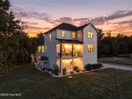210 River Oats Court, Holly Ridge, NC 28445 — 4-bedroom waterfront home in Redd's Cove, Holly Ridge, NC, photo 1 of 69: 1_virtual twilight
