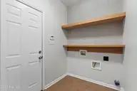 202 Winterlochen Drive, Jacksonville, NC 28540 — 3-bedroom home in Williamsburg Plantation, Jacksonville, NC, photo 15 of 37: Laundry Room