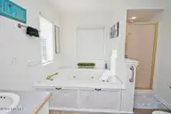 2909 Pointe West Drive 3b1, Emerald Isle, NC 28594 — 2-bedroom waterfront condo in Pier Pointe, Emerald Isle, NC, photo 18 of 34: Primary Bathroom