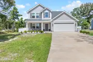 625 Millslough Lane, Sunset Beach, NC 28468 — 4-bedroom home in Shoreline Woods, Sunset Beach, NC, photo 2 of 38
