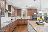 2585 Parkridge Drive, Southport, NC 28461 — 4-bedroom waterfront home in St James, Southport, NC, photo 18 of 77: Island includes Generous Cabinetry