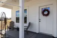 456 Pointe Vista Drive, Elizabeth City, NC 27909 — 4-bedroom waterfront home in The Waters At Sunset Pointe, Elizabeth City, NC, photo 6 of 49: 34-456 Pointe Vista - Exterior-4