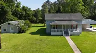 305 E Oak Street, Lake Waccamaw, NC 28450 — 3-bedroom home, Lake Waccamaw, NC, photo 2 of 44: Front