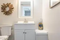 1509 Ocean Drive West, Emerald Isle, NC 28594 — 4-bedroom waterfront townhome in Emerald Isle By The Sea, Emerald Isle, NC, photo 18 of 26: 2 Seas the Day West 010 hall powder