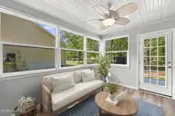 1122 Barkentine Drive, New Bern, NC 28560 — 3-bedroom waterfront home in Fairfield Harbour, New Bern, NC, photo 6 of 56: Carolina room-virtually staged