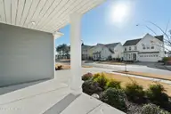 1368 Trisail Terrace, Wilmington, NC 28412 — 3-bedroom home in Riverlights, Wilmington, NC, photo 3 of 68: 1368 Trisail Front porch view