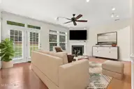120 Shadow Creek Court, Pinehurst, NC 28374 — 4-bedroom townhome in Villas at Forest Hills, Pinehurst, NC, photo 13 of 46: living room1 VS