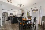 1803 W Yacht Drive, Oak Island, NC 28465 — 3-bedroom home in Pinners Point, Oak Island, NC, photo 9 of 39: Dining area
