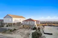 4025 E Beach Drive, Oak Island, NC 28465 — 3-bedroom waterfront home in Long Beach, Oak Island, NC, photo 8 of 40: 15-web-or-mls-CAMMediaLLC.com (15 of 47)