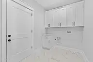 1655 Old Salt Run SW L-45, Shallotte, NC 28470 — 4-bedroom home in Tidewater at Ocean Isle, Shallotte, NC, photo 24 of 38: James laundry