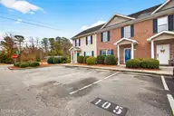 103 Lincoln Place Circle, Leland, NC 28451 — 3-bedroom townhome in Lincoln Place Townhomes, Leland, NC, photo 3 of 41: Front of Townhome