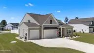 353 Mayflower Drive NW, Calabash, NC 28467 — 4-bedroom home in Allston Park, Calabash, NC, photo 3 of 46: 1-web-or-mls-DJI_20260410130441_0009_D